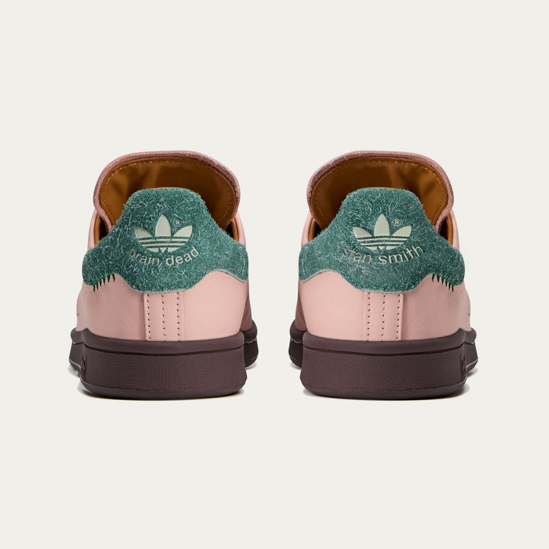 adidas Stan Smith x Brain Dead sneakers with bold color accents, custom laces, and a signature lace chain detail.
