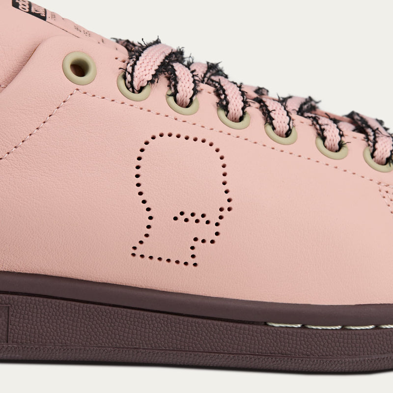adidas Stan Smith x Brain Dead sneakers with bold color accents, custom laces, and a signature lace chain detail.