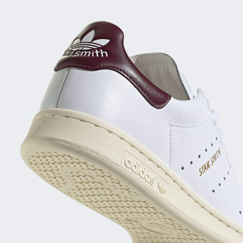 adidas Stan Smith Lux shoes showcasing premium leather craftsmanship with folded edge detailing and reinforced stitching, designed for durability and elegance.


