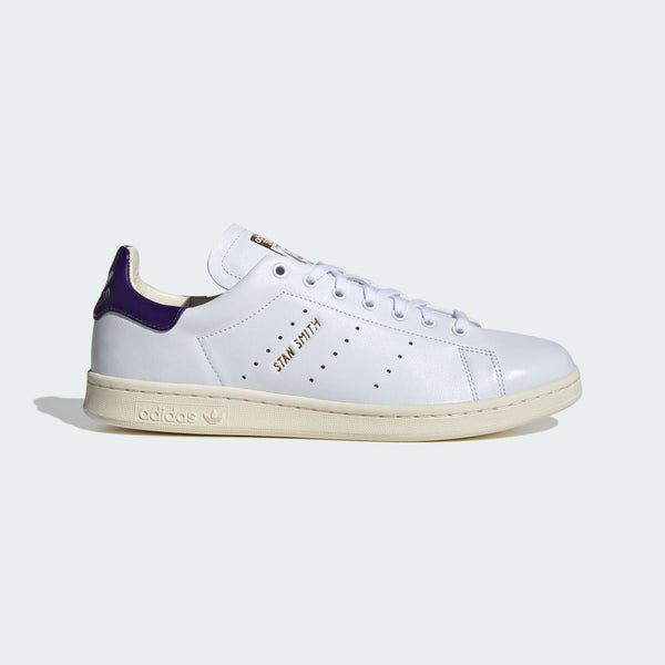 adidas Stan Smith Lux shoes showcasing premium leather craftsmanship with folded edge detailing and reinforced stitching, designed for durability and elegance.


