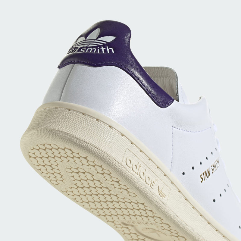 adidas Stan Smith Lux shoes showcasing premium leather craftsmanship with folded edge detailing and reinforced stitching, designed for durability and elegance.


