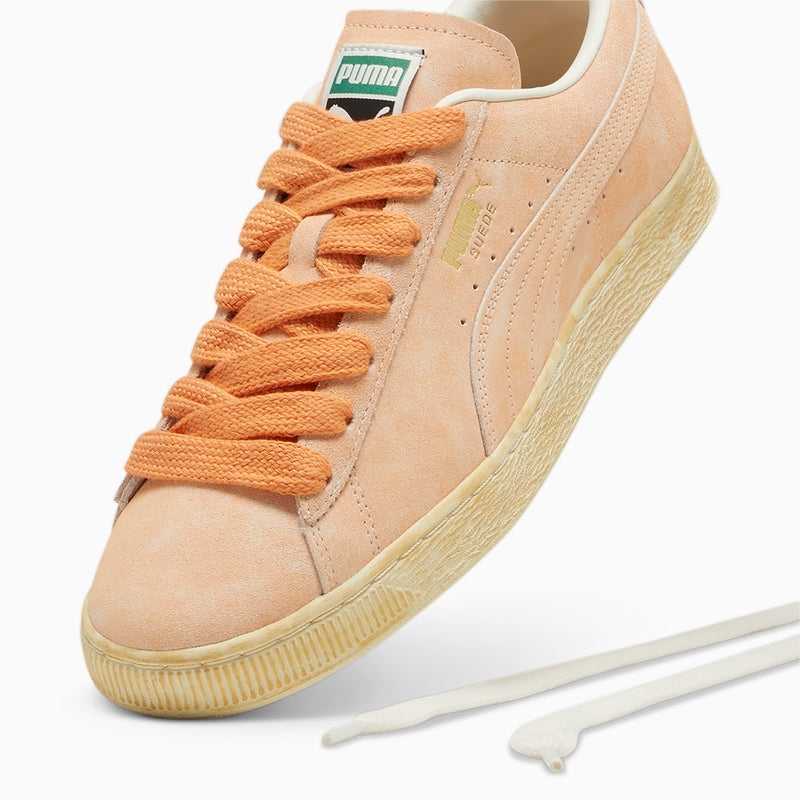 Vintage PUMA Suede sneaker with worn suede upper, honoring its iconic heritage since 1968.