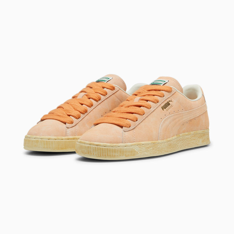 Vintage PUMA Suede sneaker with worn suede upper, honoring its iconic heritage since 1968.