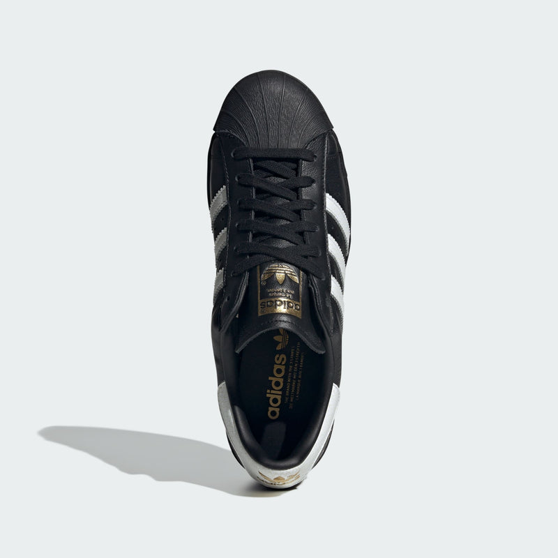 adidas Superstar 82 shoes with iconic shell toe, leather upper, and durable rubber outsole