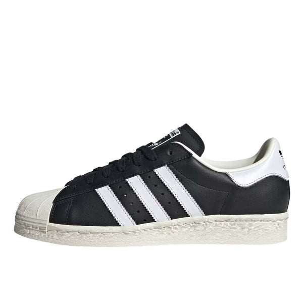 adidas Superstar 82 shoes featuring smooth leather, signature rubber shell toe, and rubber cupsole.