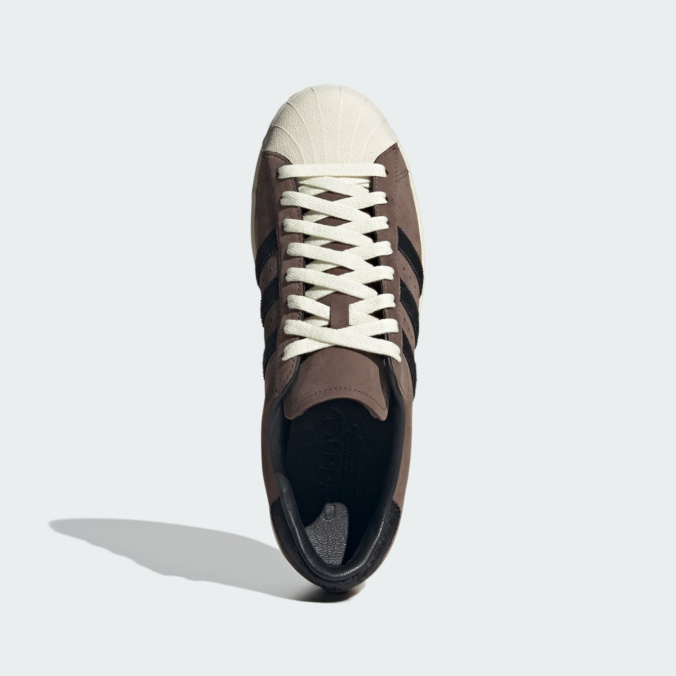 adidas Superstar shoes with premium nubuck upper, pony hair 3-Stripes and heel, and classic shell toe design