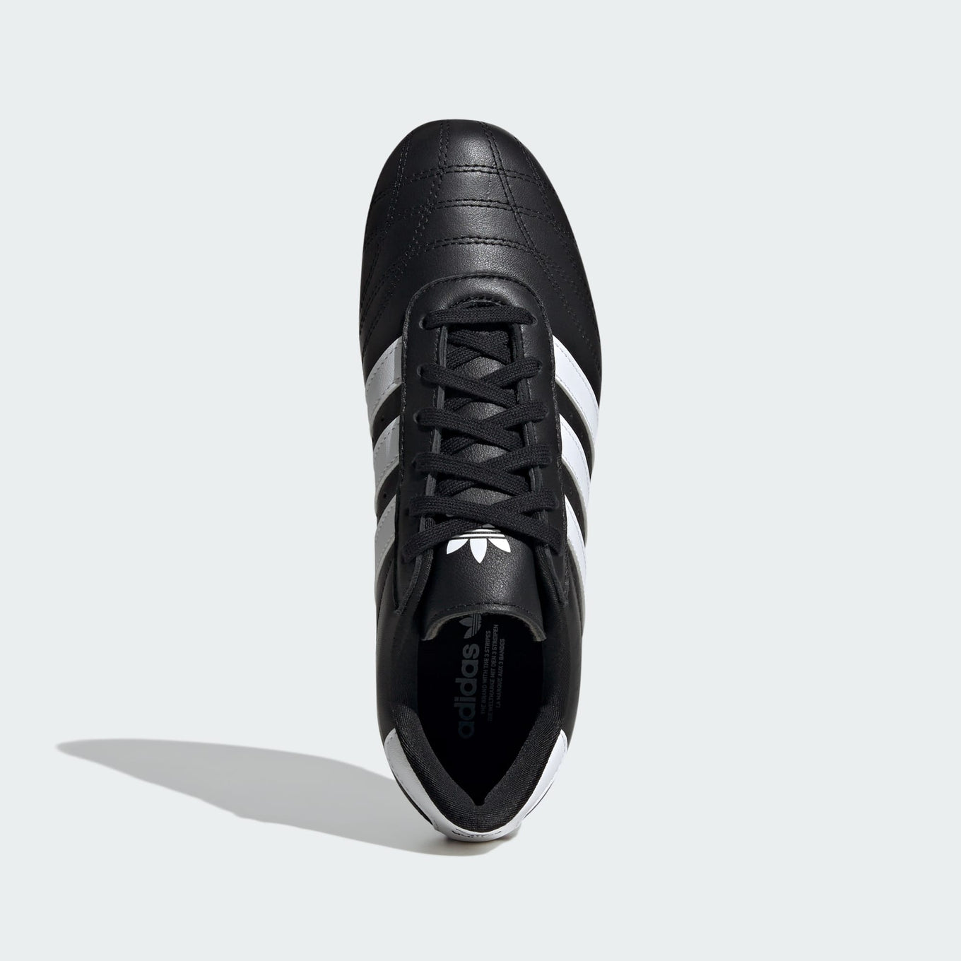 adidas trainers with minimalist design, soft leather, quilted toes, and classic 3-Stripes