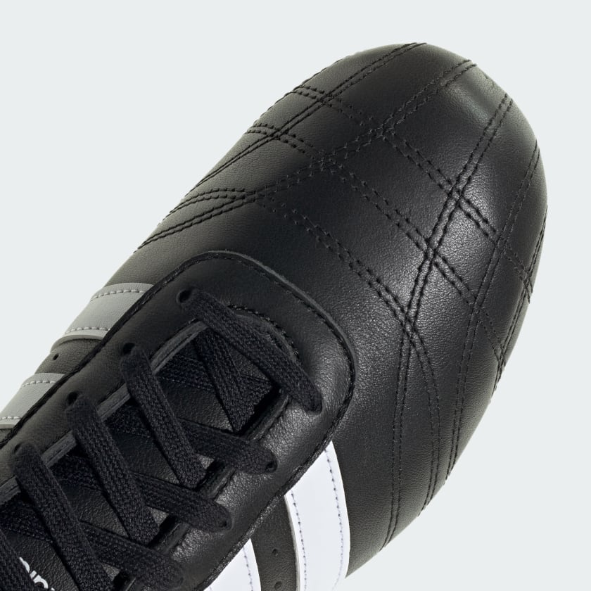 adidas trainers with minimalist design, soft leather, quilted toes, and classic 3-Stripes