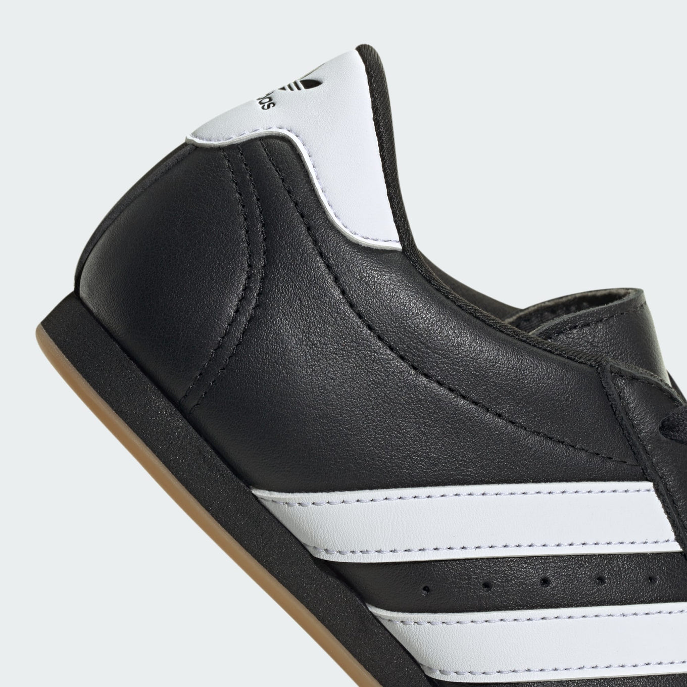 adidas trainers with minimalist design, soft leather, quilted toes, and classic 3-Stripes