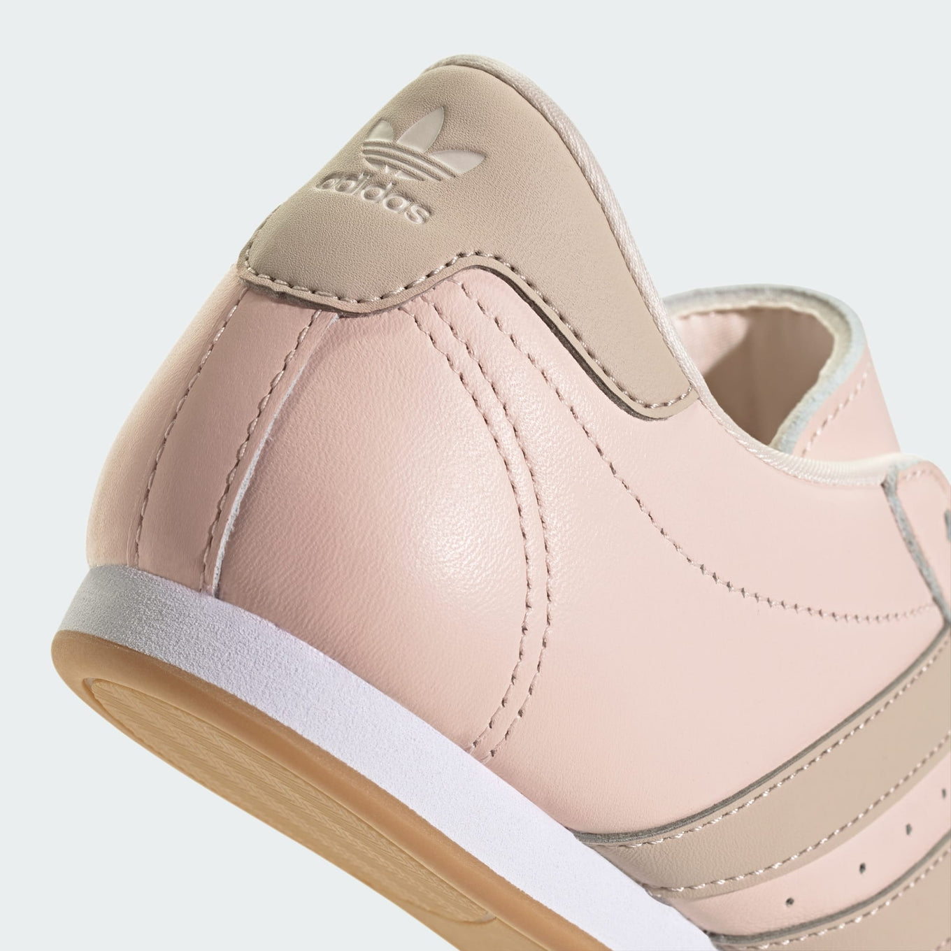 adidas Taekwondo Shoes with a sleek leather upper, low-profile outsole, and 3D quilting details, inspired by early 2000s design.