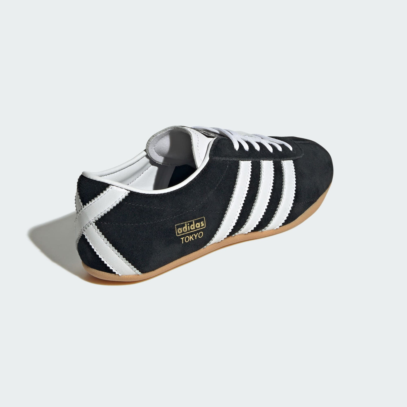 adidas Tokyo shoes with a suede upper, slim silhouette, and rubber outsole, combining retro-inspired design with everyday comfort.