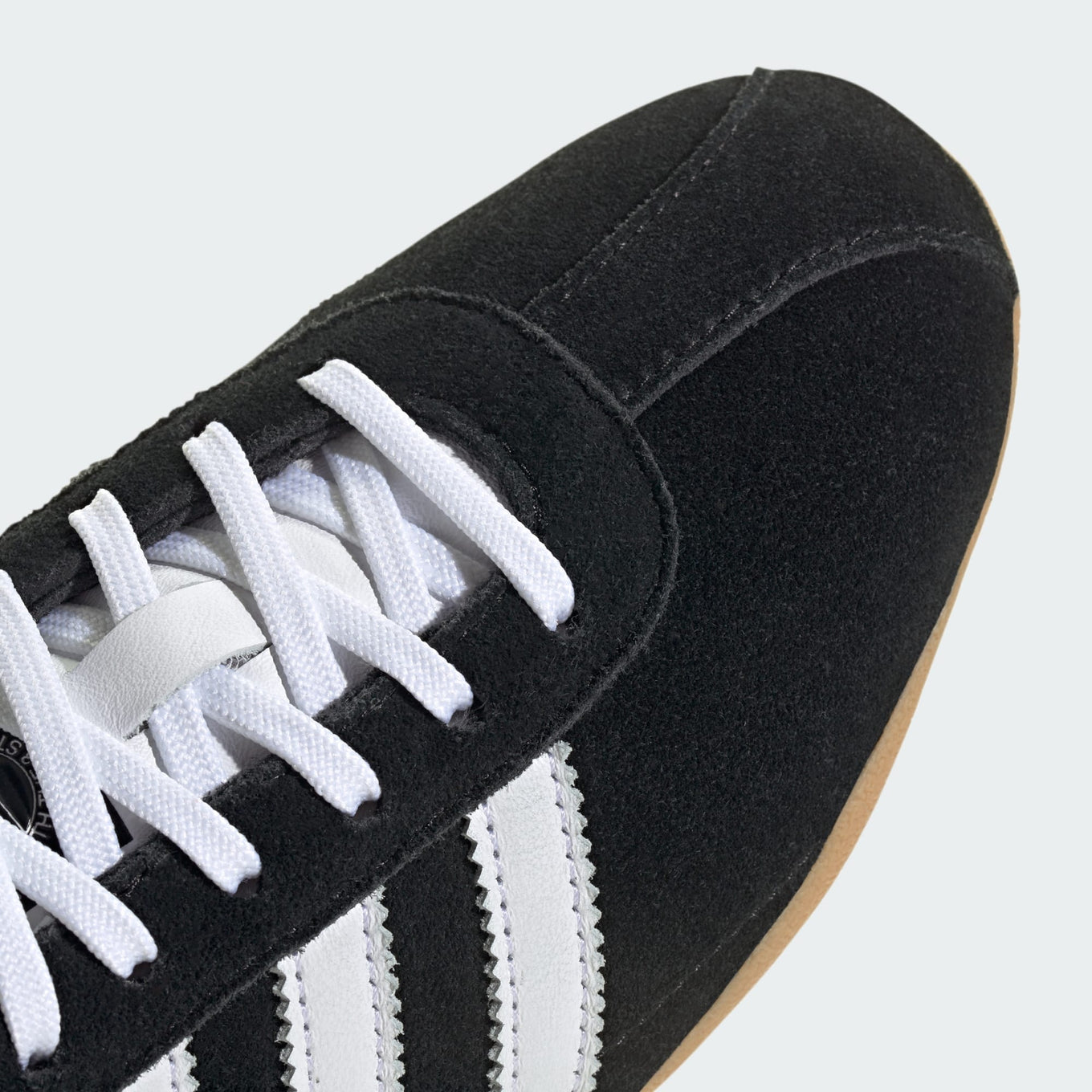 adidas Tokyo shoes with a suede upper, slim silhouette, and rubber outsole, combining retro-inspired design with everyday comfort.