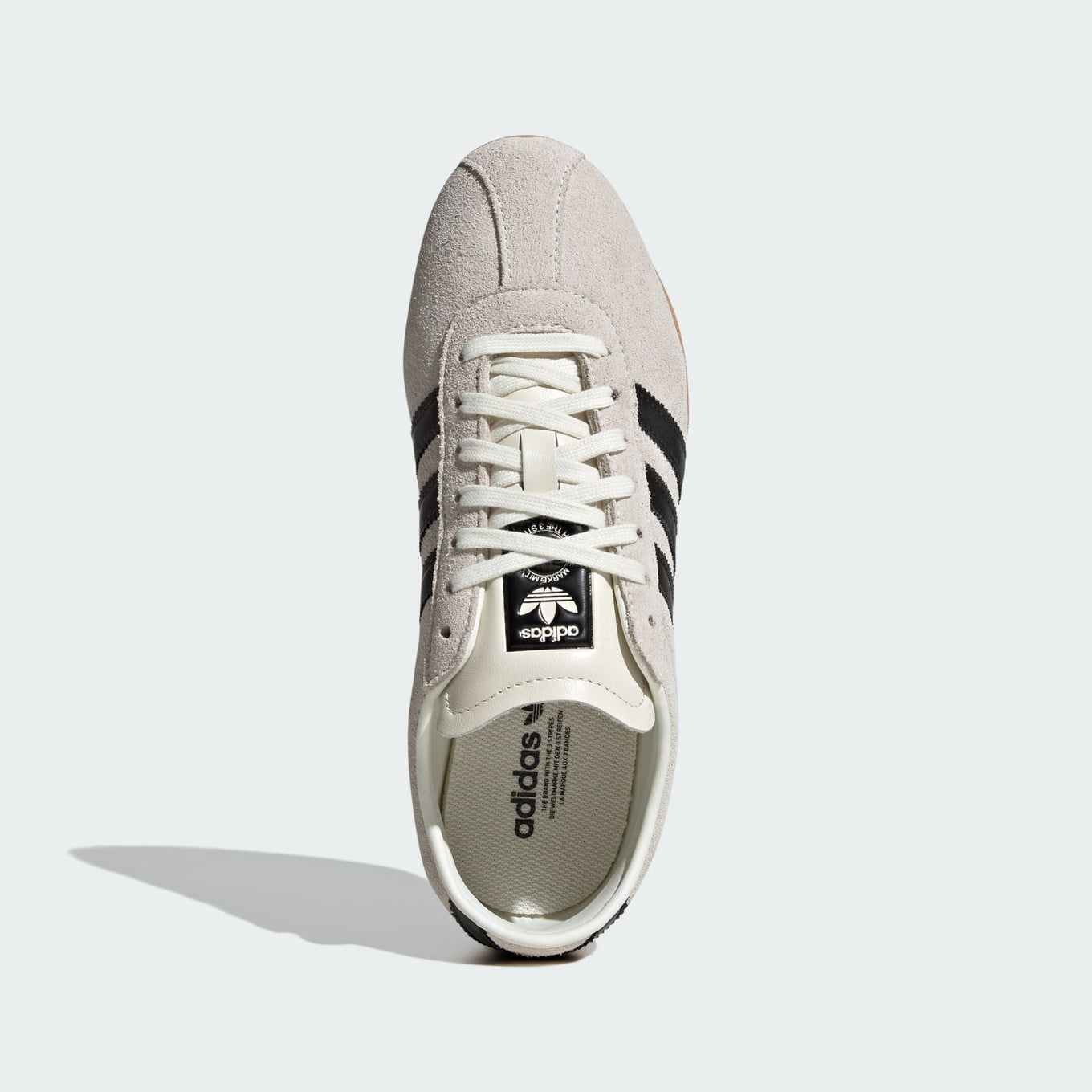 adidas Tokyo shoes with a soft suede upper, slim profile, and rubber outsole, blending retro aesthetics with modern comfort.
