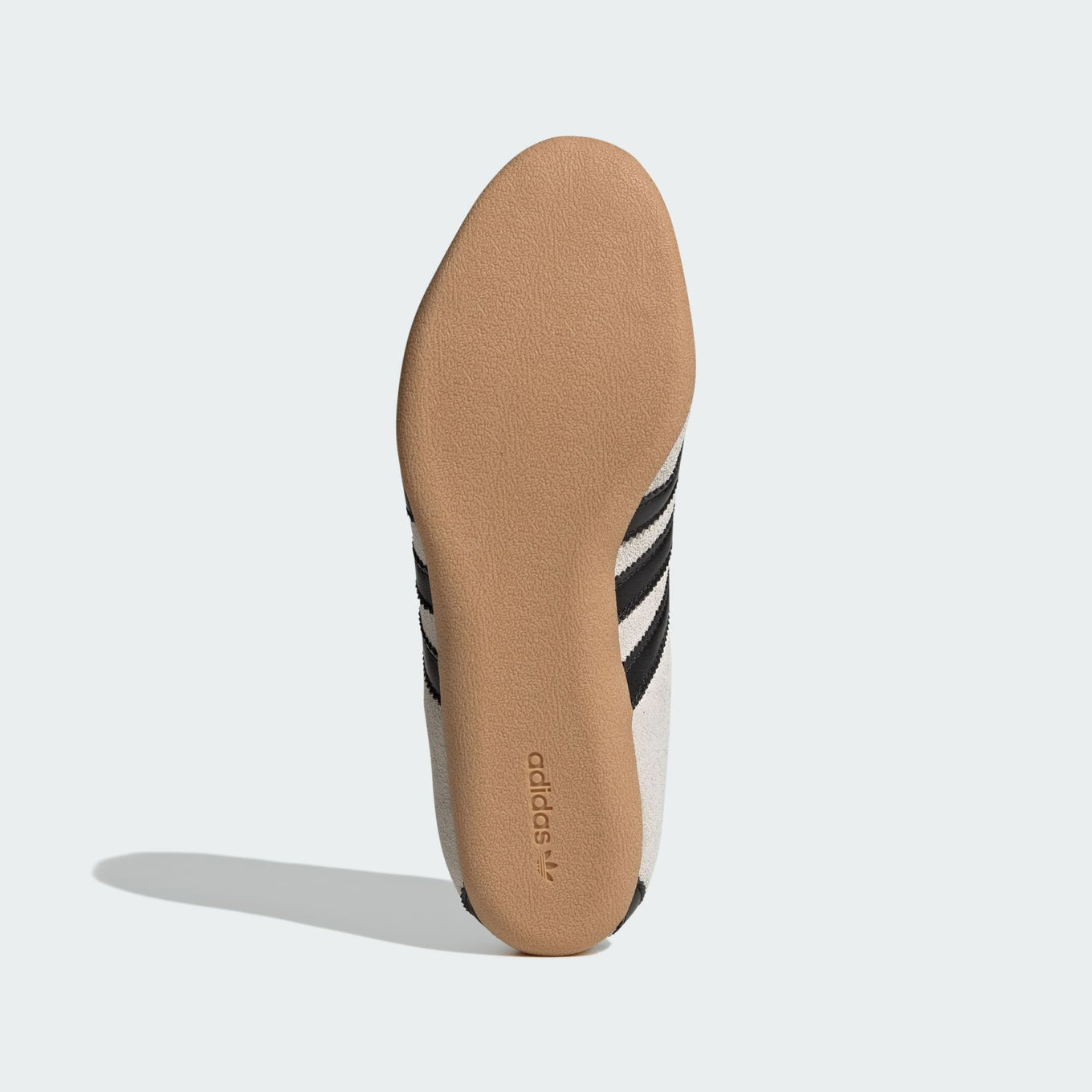 adidas Tokyo shoes with a soft suede upper, slim profile, and rubber outsole, blending retro aesthetics with modern comfort.