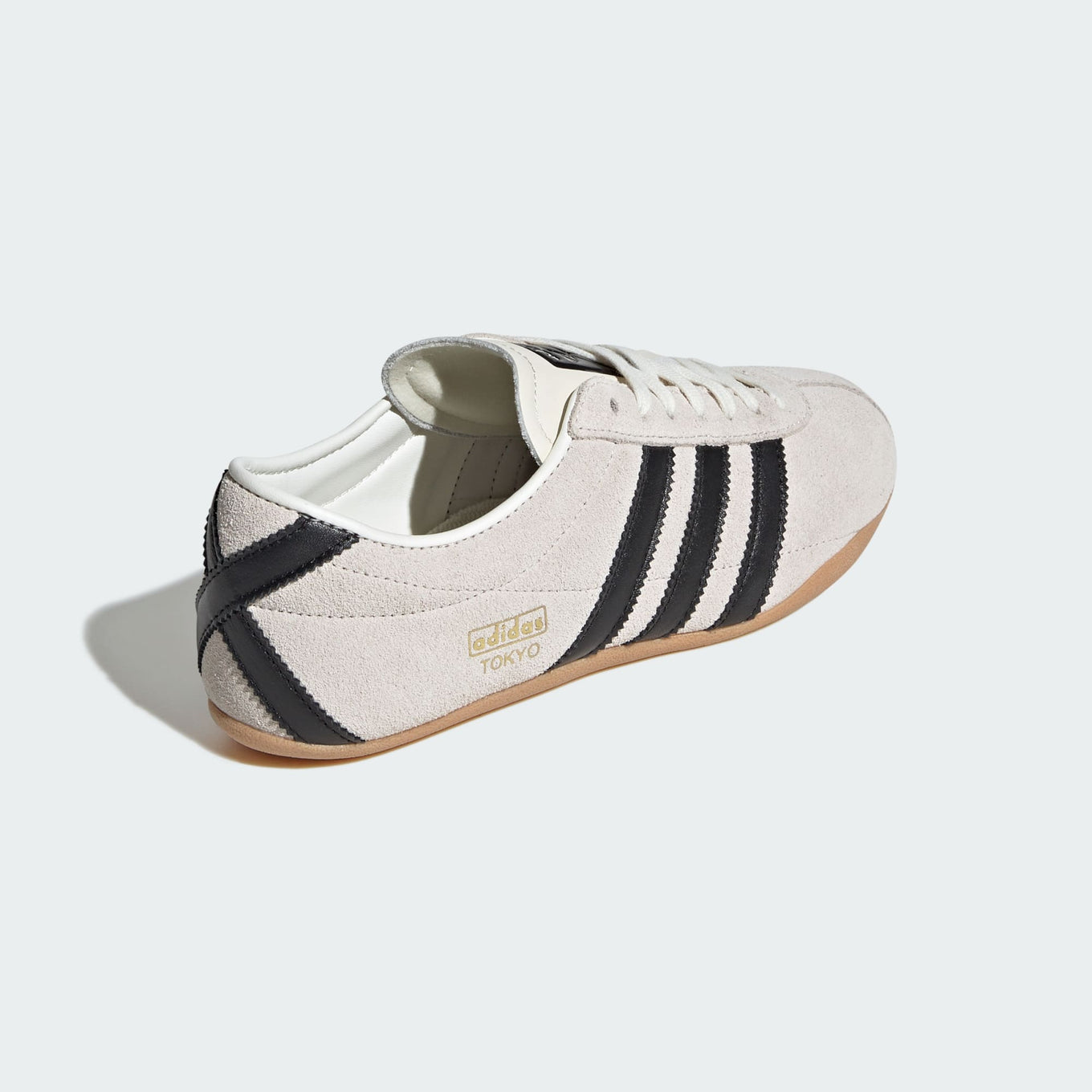 adidas Tokyo shoes with a soft suede upper, slim profile, and rubber outsole, blending retro aesthetics with modern comfort.
