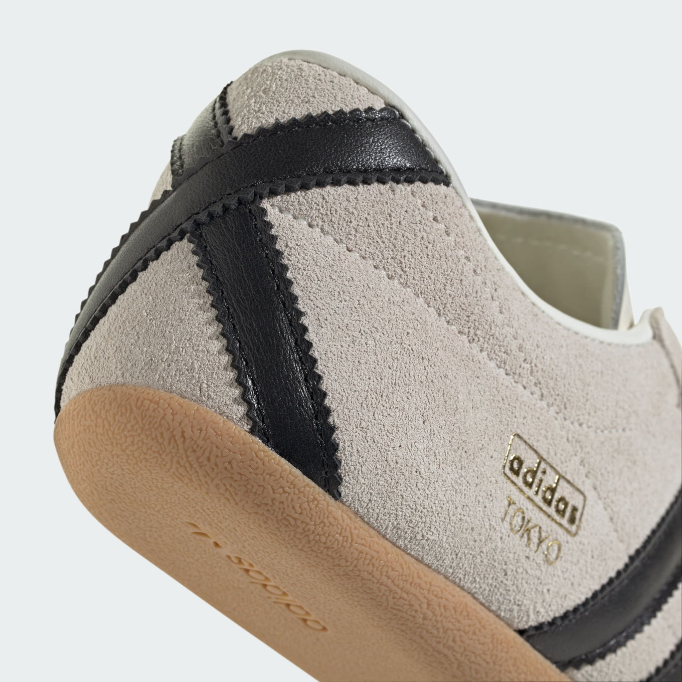 adidas Tokyo shoes with a soft suede upper, slim profile, and rubber outsole, blending retro aesthetics with modern comfort.