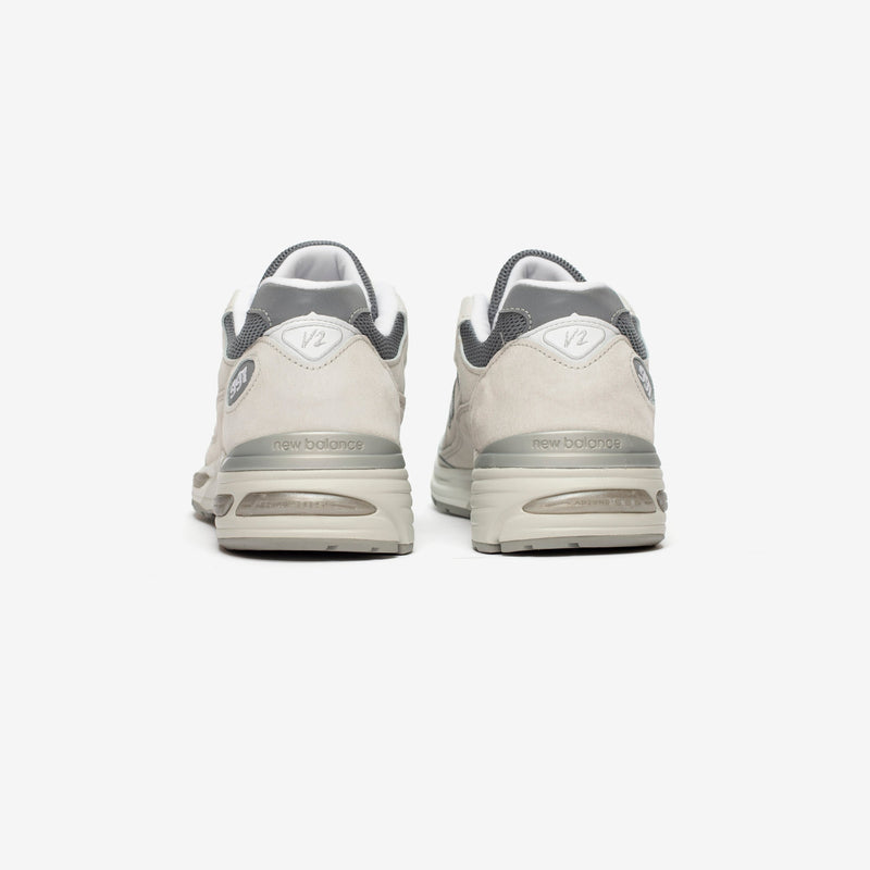 New Balance 991v2 MADE in UK running shoe in pigskin suede, mesh, and synthetic materials, featuring a streamlined profile, full-length FuelCell cushioning, and classic ABZORB SBS pods and ENCAP features.