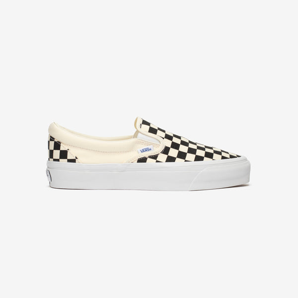 Premium Slip-On 98 Shoes featuring a checkerboard print, full-grain leather collar lining, gloss-finished sidewalls, and Sola Foam All-Day-Comfort.