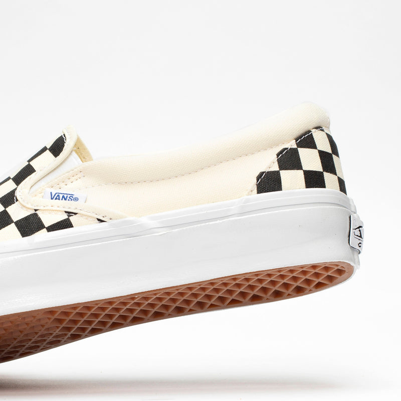 Premium Slip-On 98 Shoes featuring a checkerboard print, full-grain leather collar lining, gloss-finished sidewalls, and Sola Foam All-Day-Comfort.