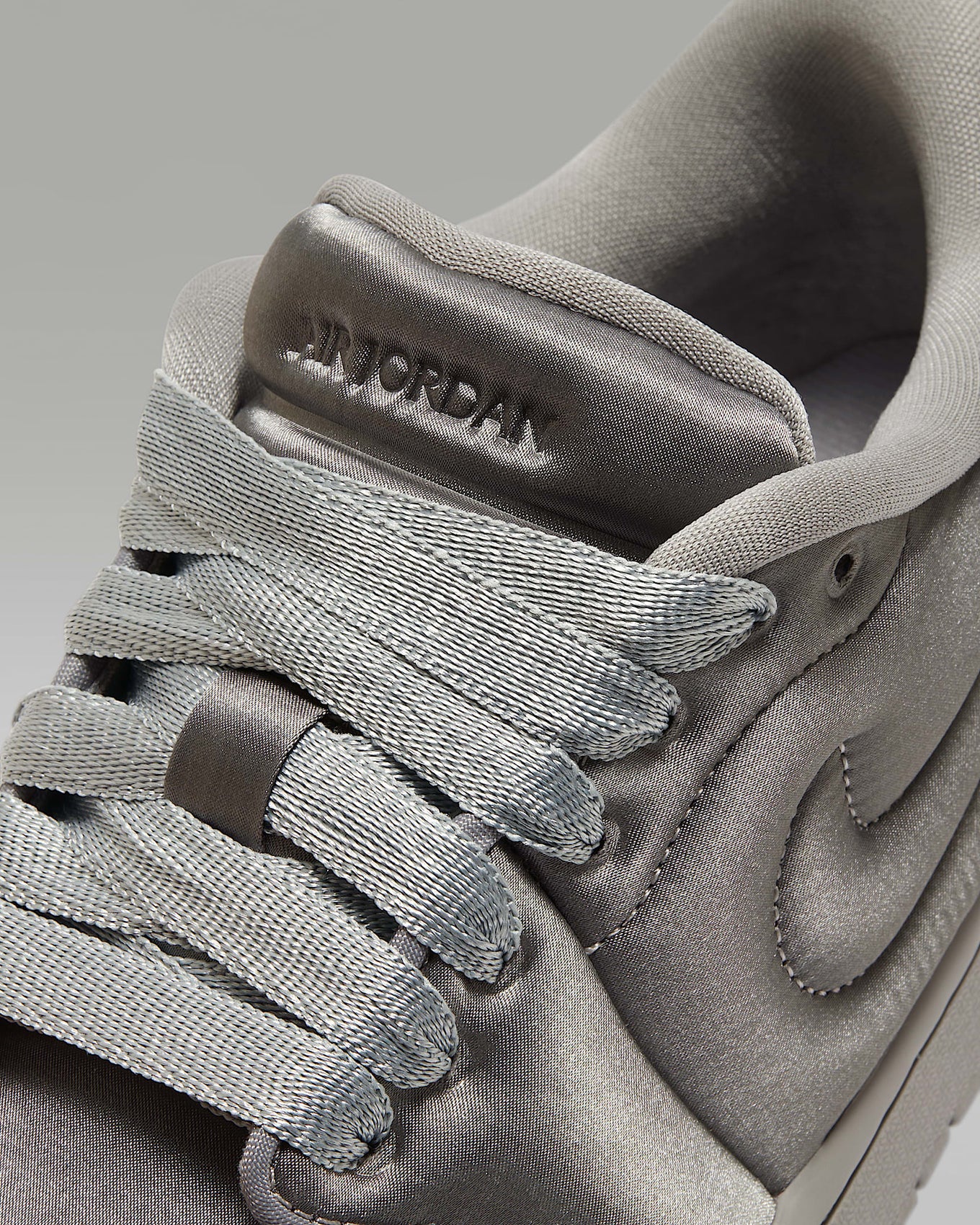 Air Jordan 1 ‘Method of Make’ sneaker with a monochromatic satin design, color-matched details, and a luxurious finish.







