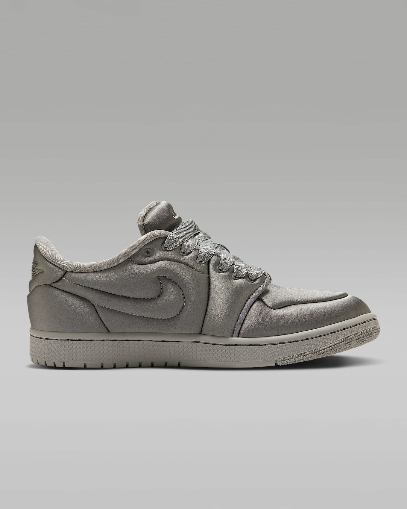 Air Jordan 1 ‘Method of Make’ sneaker with a monochromatic satin design, color-matched details, and a luxurious finish.







