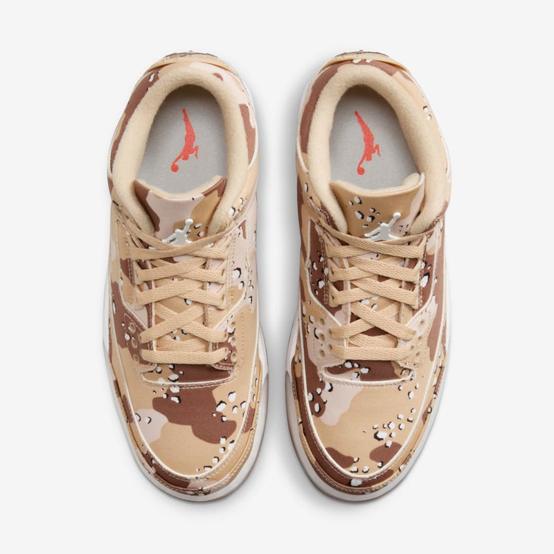 Desert Camo edition of the AJ3 sneakers with textured textile upper, raised Jumpman logo on tongue, Brilliant Orange accents on sole, and matching dog tag for laces