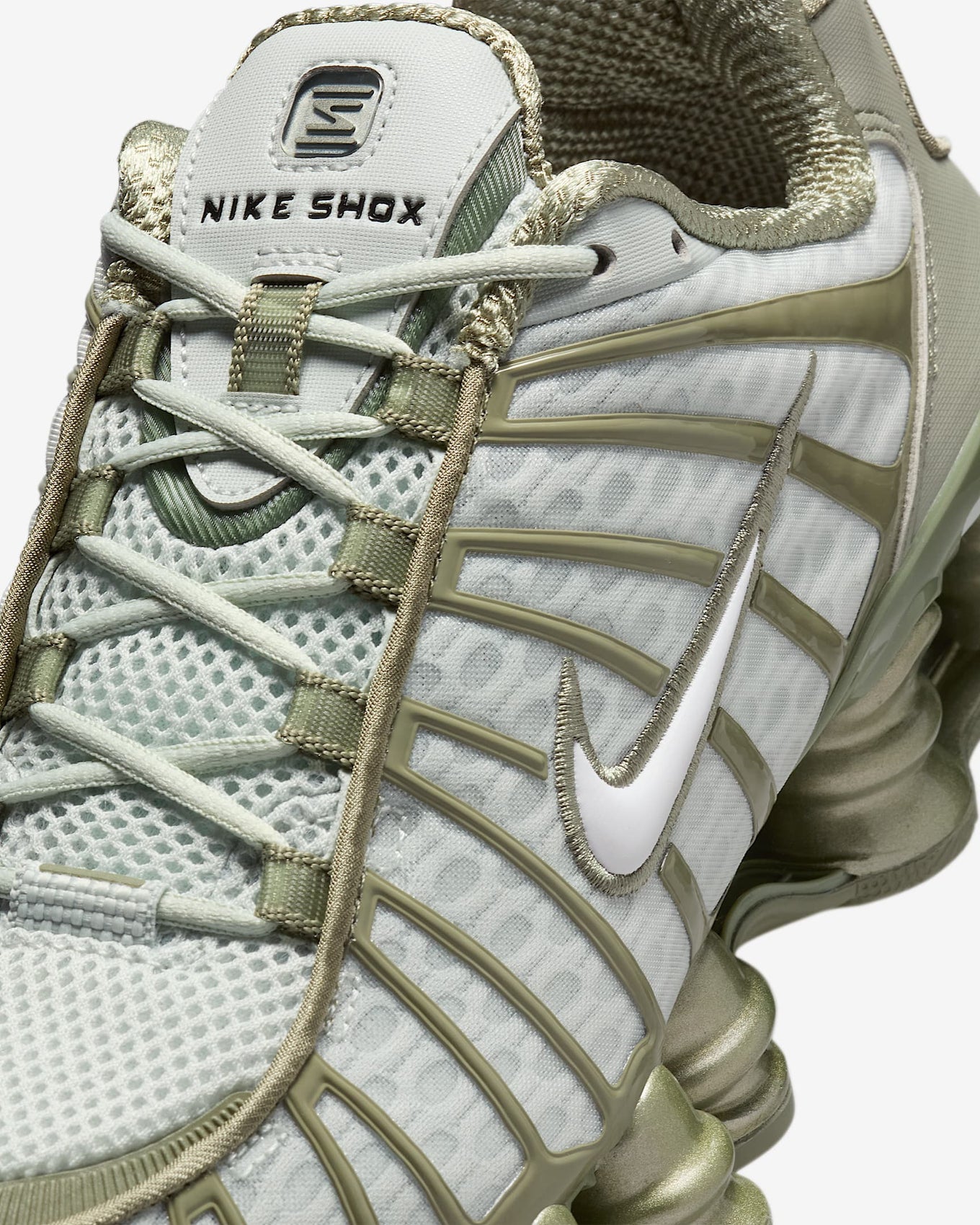Nike Shox TL sneaker with breathable mesh upper and full-length Shox cushioning for optimal comfort and street style.







