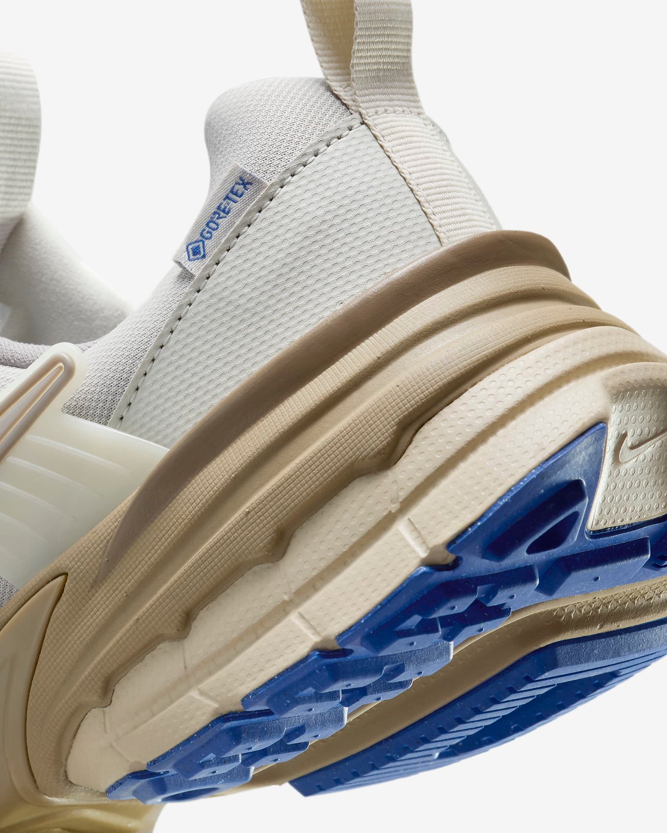 Winterized V2K sneaker with a GORE-TEX upper, chunky heel, and early 2000s running style, offering cushioning and lightweight comfort for a Y2K-inspired look.