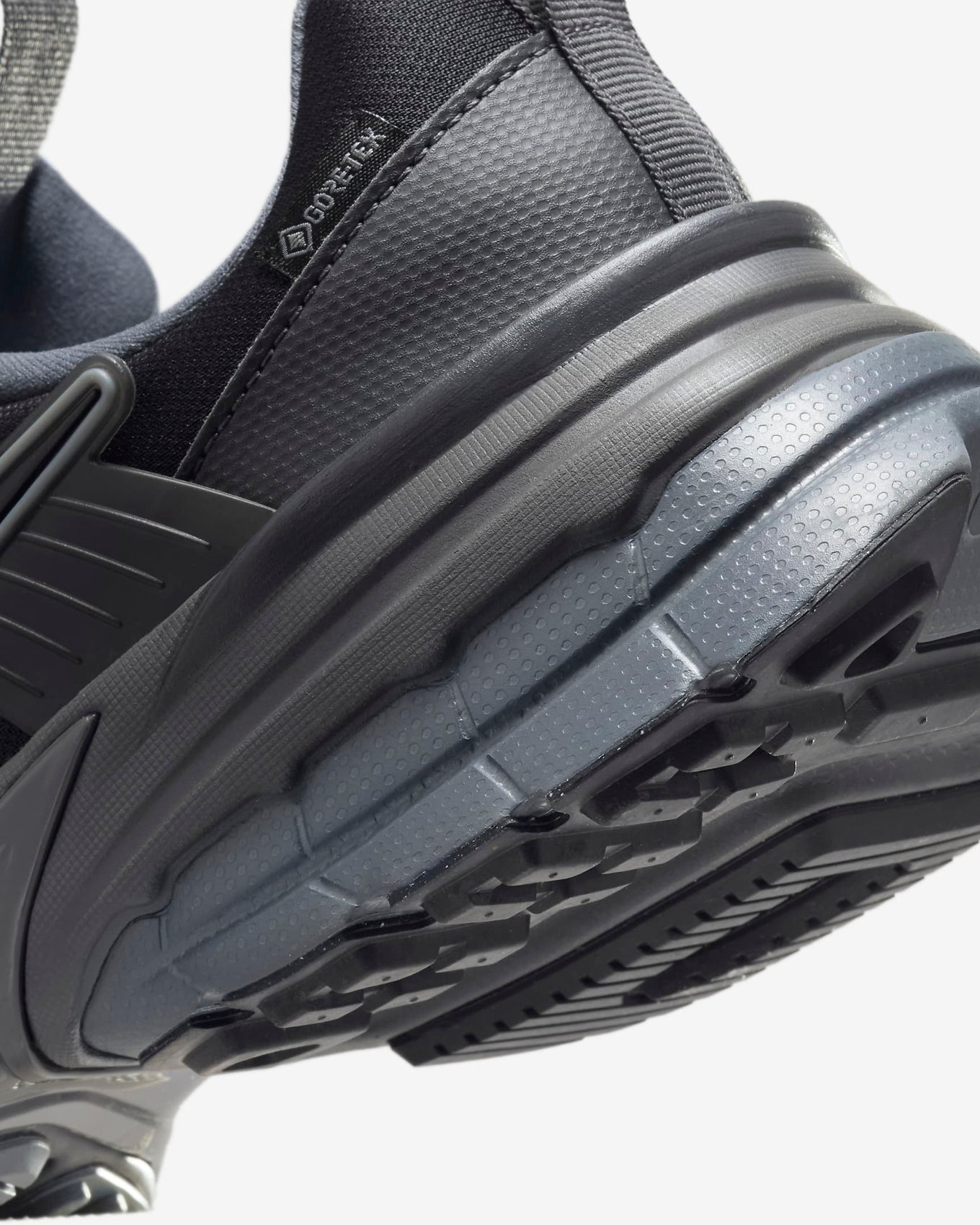 Winterized V2K sneaker with a GORE-TEX upper, chunky heel, and early 2000s running style, offering cushioning and lightweight comfort for a Y2K-inspired look.