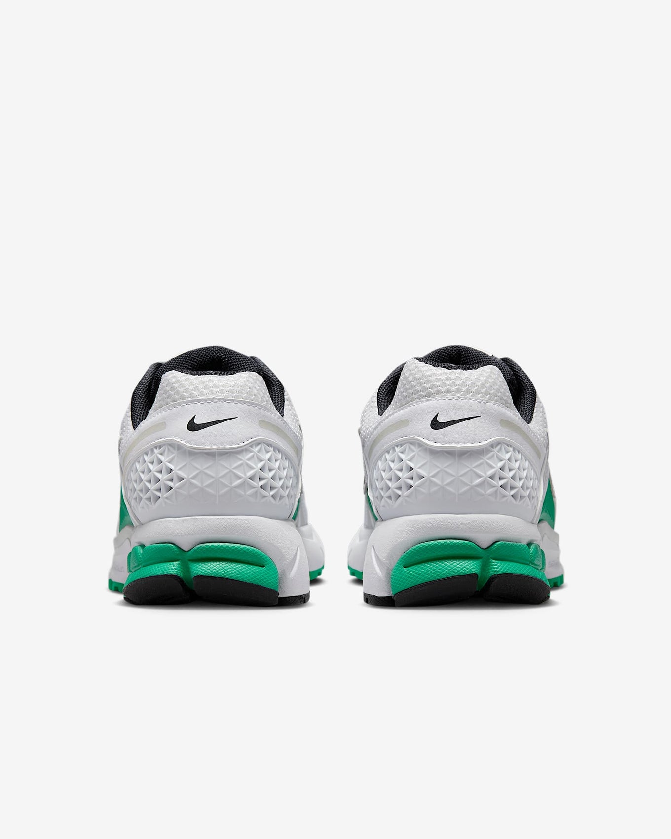 Zoom Vomero 5 "White/Stadium Green" with mesh upper, synthetic overlays, Zoom Air, and durable rubber outsole.