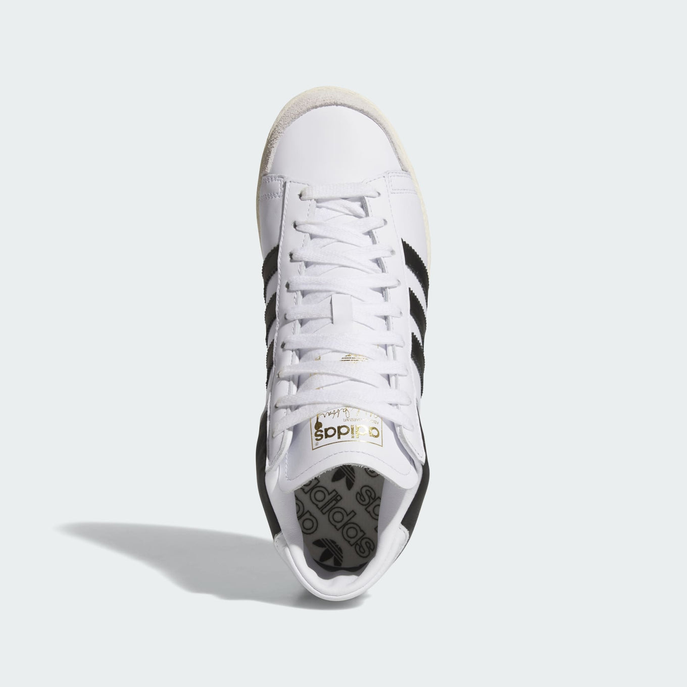 adidas Jabbar Hi sneakers with a leather upper, suede toe cap, and vintage basketball-inspired design for a timeless streetwear look.