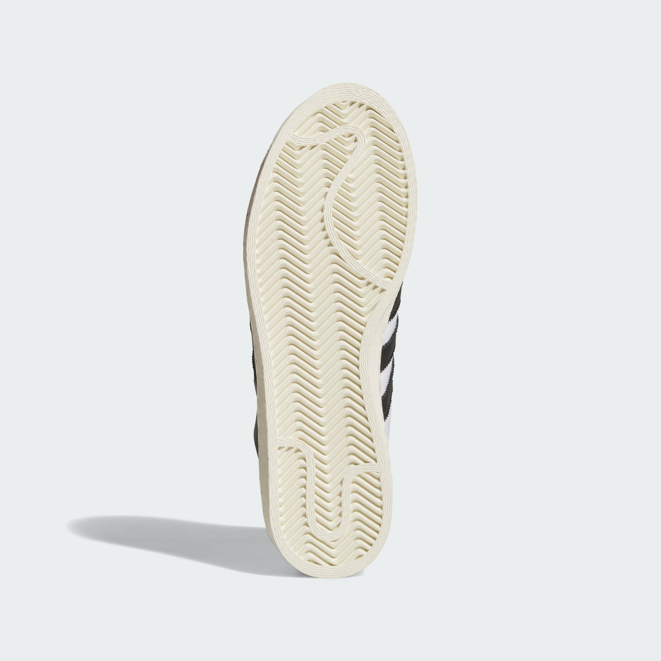 adidas Jabbar Hi sneakers with a leather upper, suede toe cap, and vintage basketball-inspired design for a timeless streetwear look.