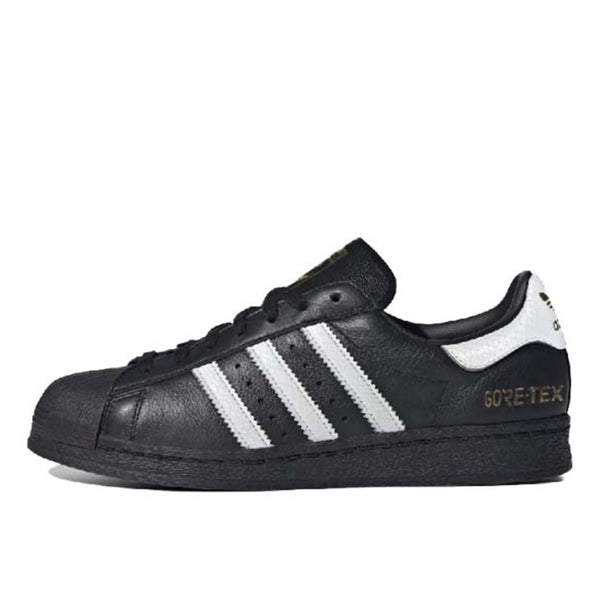 adidas Superstar 82 shoes with iconic shell toe, leather upper, and durable rubber outsole. 