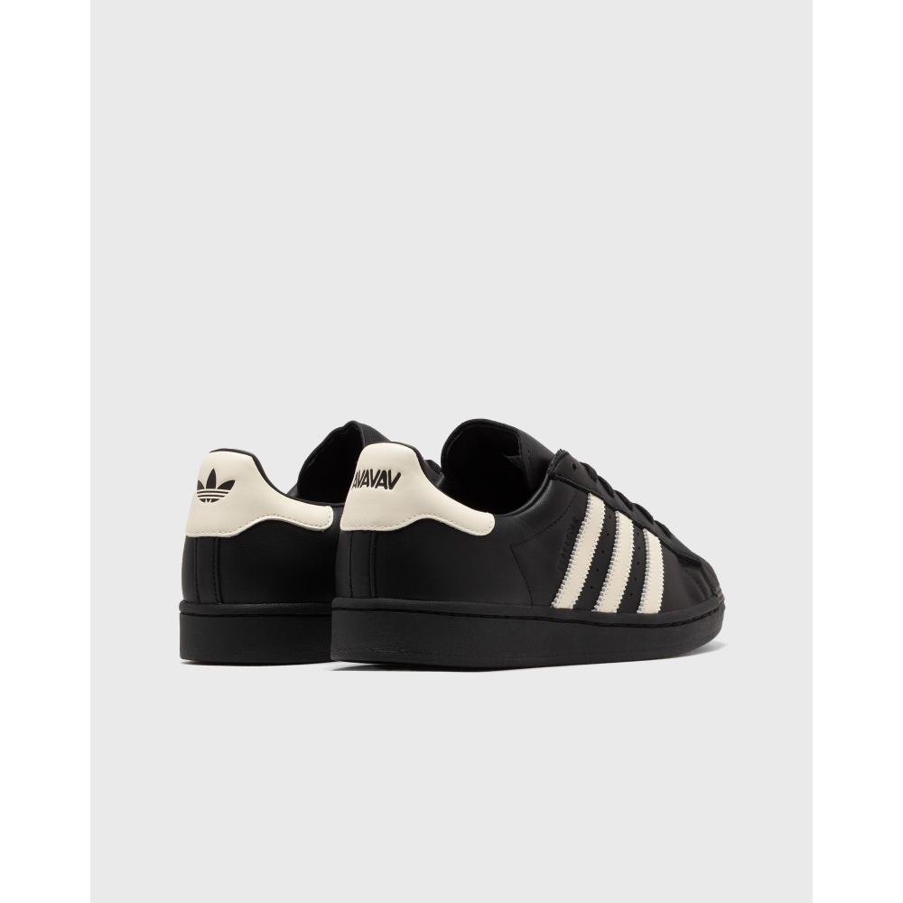 AVAVAV x adidas Originals Superstar sneaker featuring oversized, finger-like extensions on the shell toe with signature three stripes and co-branded details.