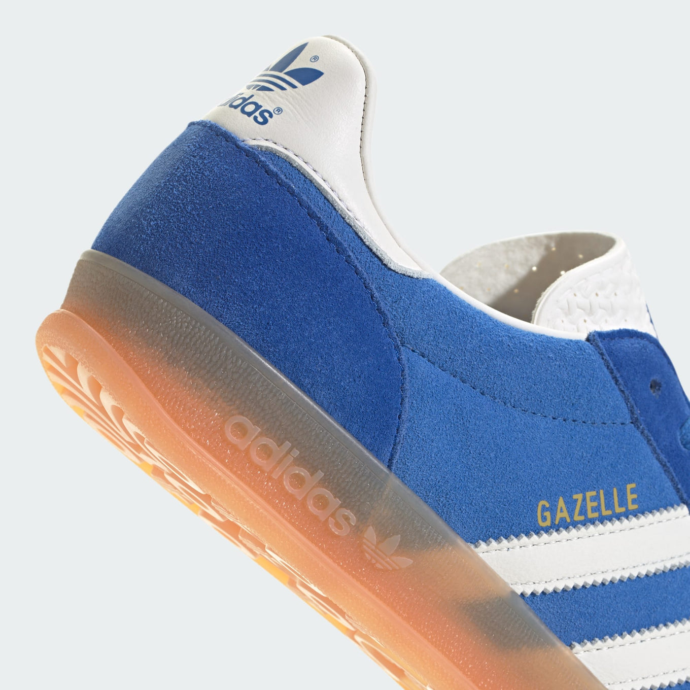 adidas Gazelle Indoor Pro shoes with a suede upper, leather lining, translucent wrapped sole, and signature 3-Stripes, blending vintage sports heritage with contemporary street style.