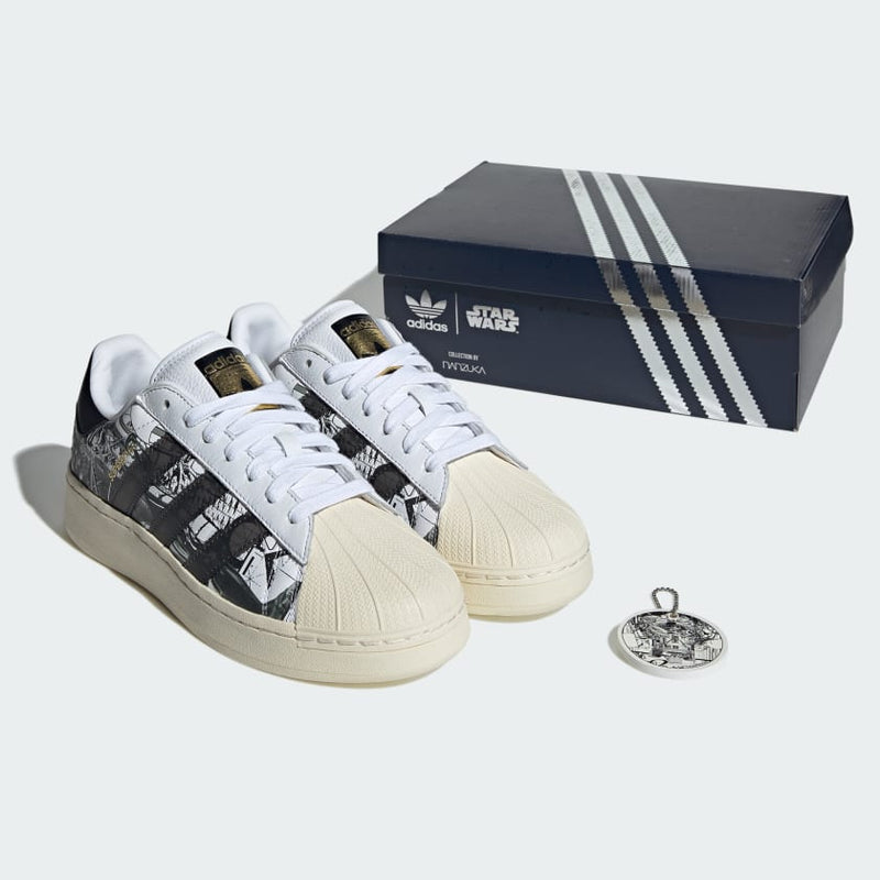 Adidas Superstar trainers featuring unique R2-D2 and C-3PO prints by artist Hiroki Tsukuda, created in collaboration with Nanzuka.