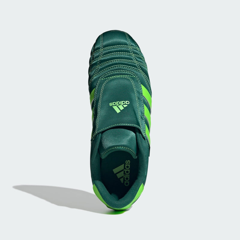 adidas slip-on shoes with smooth upper, curved stitching, and low-profile design inspired by 2000s Taekwondo trainers