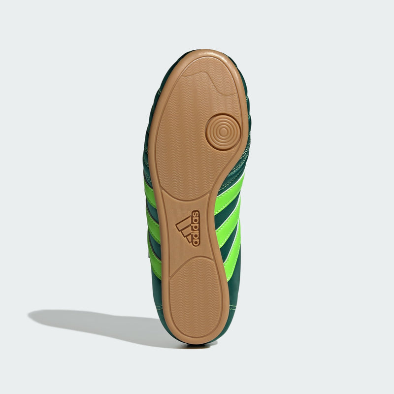 adidas slip-on shoes with smooth upper, curved stitching, and low-profile design inspired by 2000s Taekwondo trainers