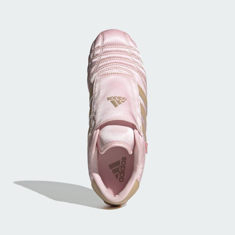 adidas slip-on shoes with smooth upper, curved stitching, and low-profile design inspired by 2000s Taekwondo trainers