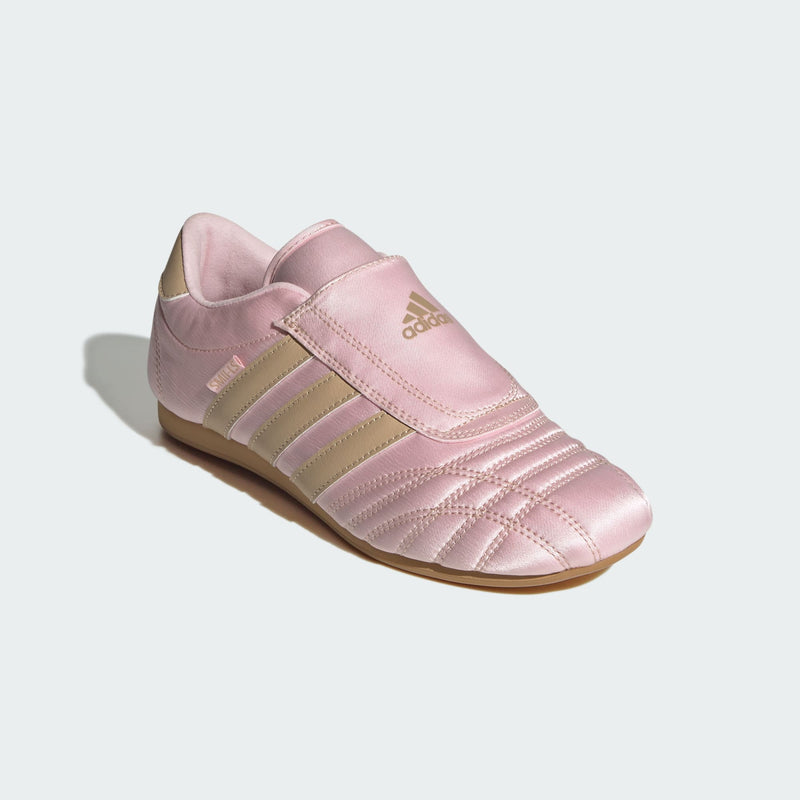 adidas slip-on shoes with smooth upper, curved stitching, and low-profile design inspired by 2000s Taekwondo trainers