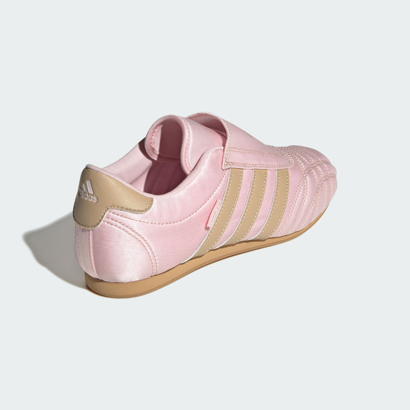 adidas slip-on shoes with smooth upper, curved stitching, and low-profile design inspired by 2000s Taekwondo trainers