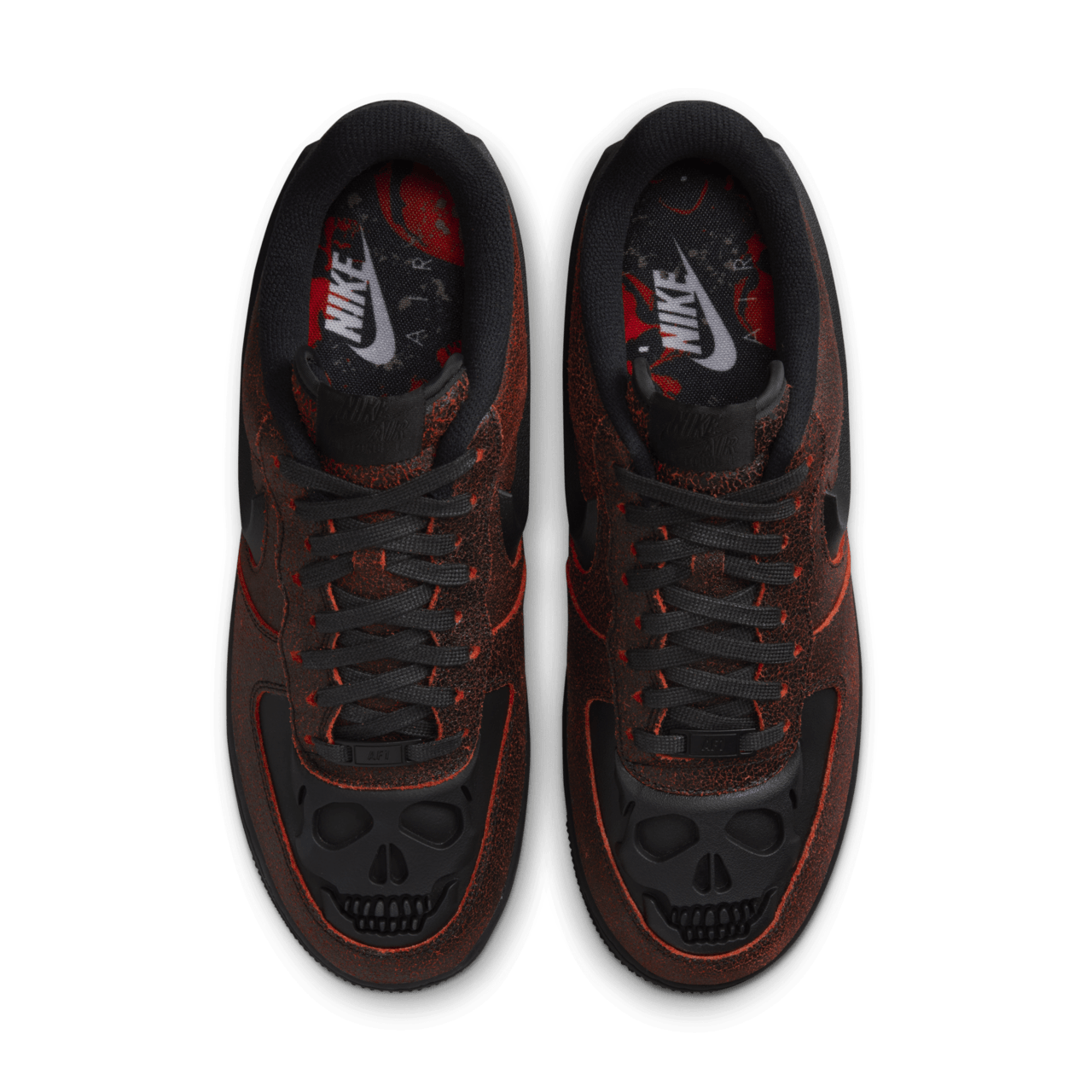 Spooky AF-1 sneakers with crackled leather finish and skull etching on toe box.