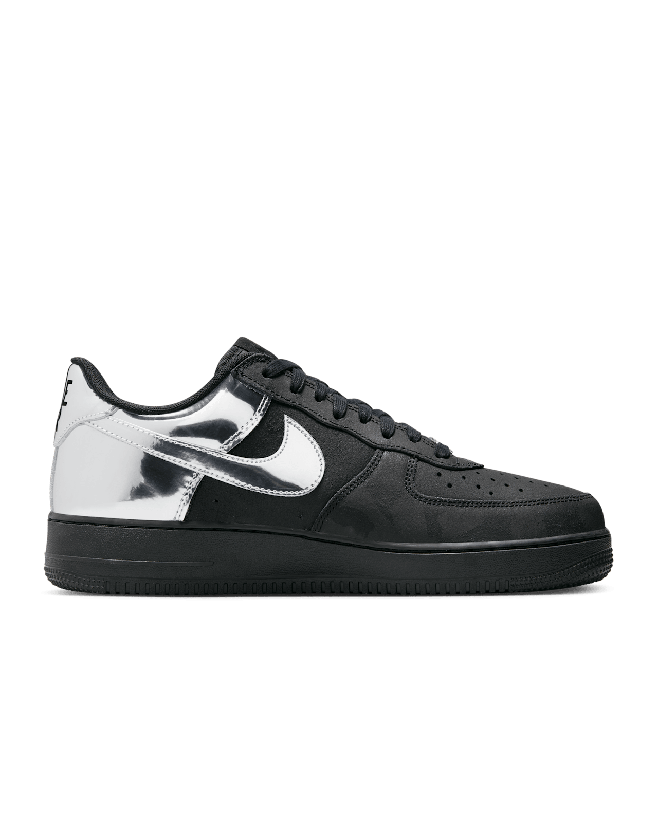Nike Air Force 1 shoes with black suede upper, chrome accents, reflective graffiti print, and star-shaped dubraes inspired by hip-hop culture