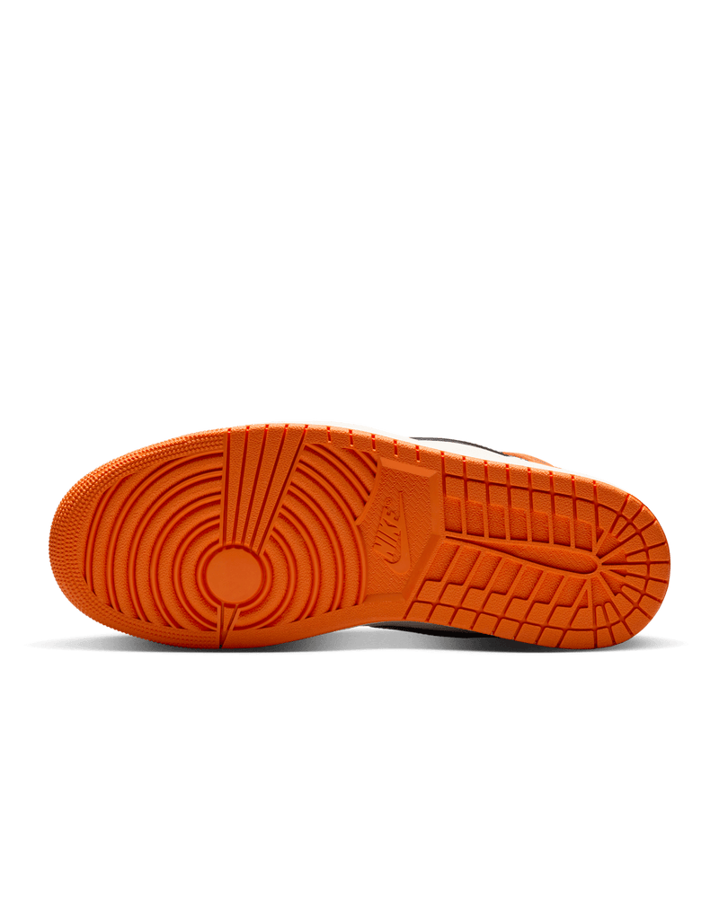 Air Jordan 1 "Shattered Backboard" sneakers with bold orange, black, and white tumbled leather design inspired by MJ’s iconic 1985 dunk in Italy.