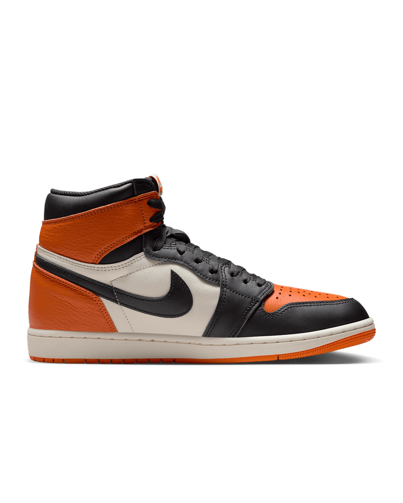 Air Jordan 1 "Shattered Backboard" sneakers with bold orange, black, and white tumbled leather design inspired by MJ’s iconic 1985 dunk in Italy.