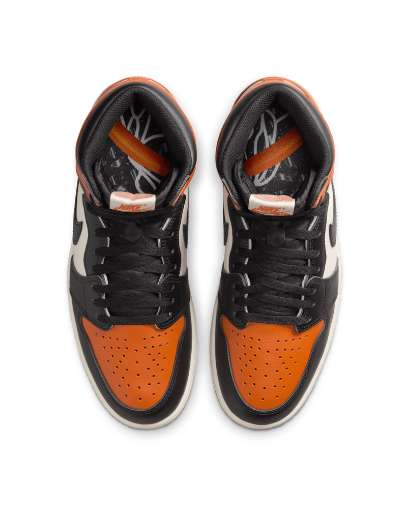 Air Jordan 1 "Shattered Backboard" sneakers with bold orange, black, and white tumbled leather design inspired by MJ’s iconic 1985 dunk in Italy.