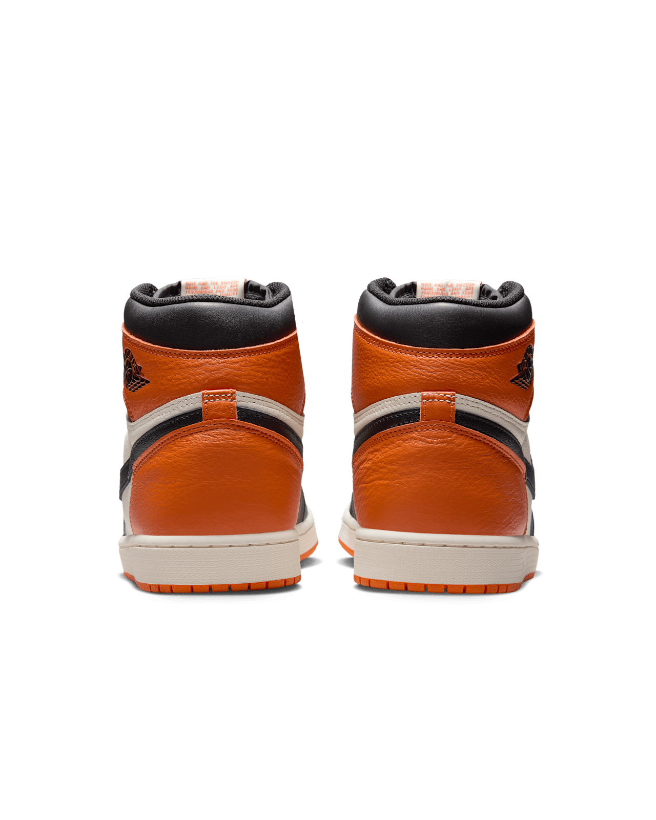 Air Jordan 1 "Shattered Backboard" sneakers with bold orange, black, and white tumbled leather design inspired by MJ’s iconic 1985 dunk in Italy.