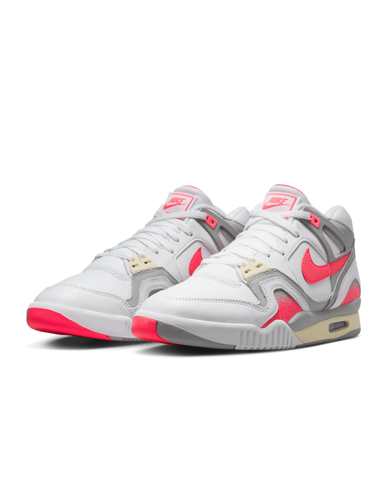 Air Tech Challenge 2 sneakers with white leather, Light Smoke Grey, and Racer Pink accents, featuring visible Max Air cushioning.