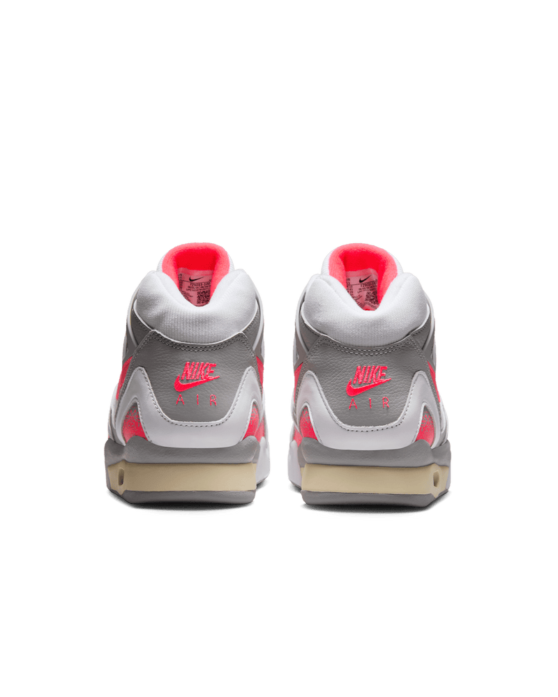 Air Tech Challenge 2 sneakers with white leather, Light Smoke Grey, and Racer Pink accents, featuring visible Max Air cushioning.
