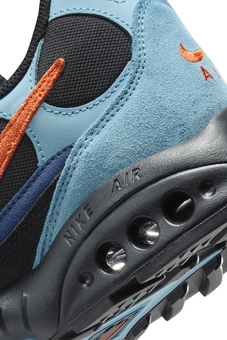 Air Terra Humara 1997 edition featuring Mystic Navy suede, Aquarius Blue textiles, and Safety Orange Swoosh, designed for urban and trail adventures.